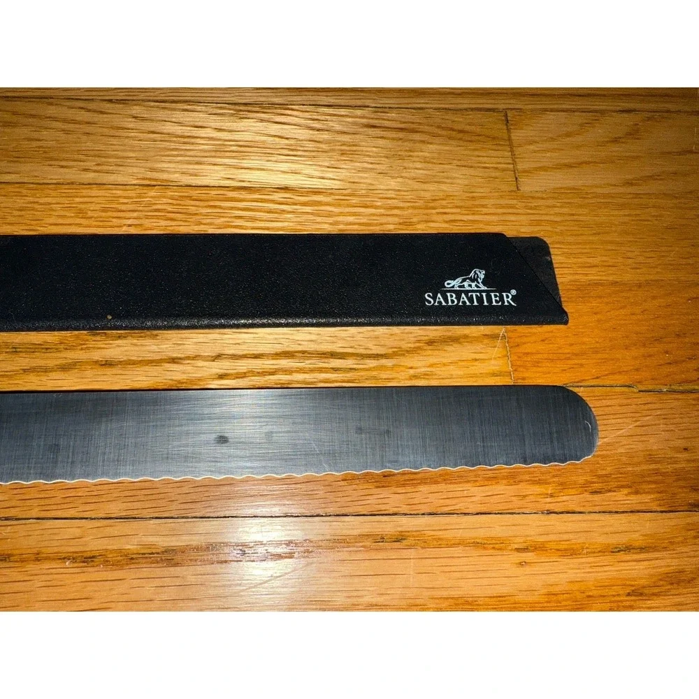 Vintage Sabatier France 10-inch serrated LeCordon Bleu knife, made in France.